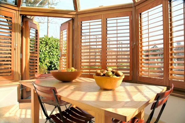 Tier-on-Tier Plantation Shutters in Houston offer the ultimate flexibility with independently operable top and bottom panels.