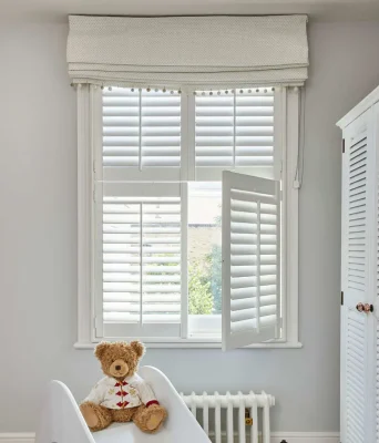 Tier-on-Tier Plantation Shutters in Houston offer the ultimate flexibility with independently operable top and bottom panels.