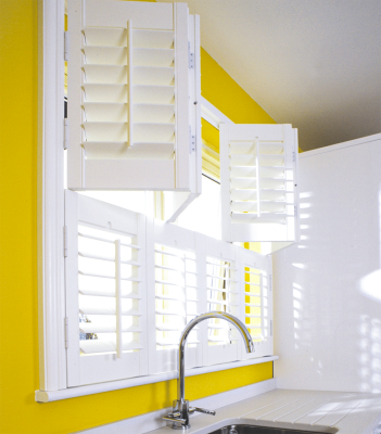 Tier-on-Tier Plantation Shutters in Houston offer the ultimate flexibility with independently operable top and bottom panels.