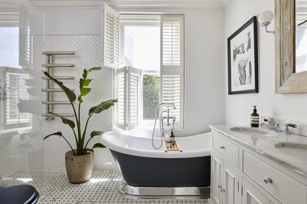 Tier-on-Tier Plantation Shutters in Houston offer the ultimate flexibility with independently operable top and bottom panels.